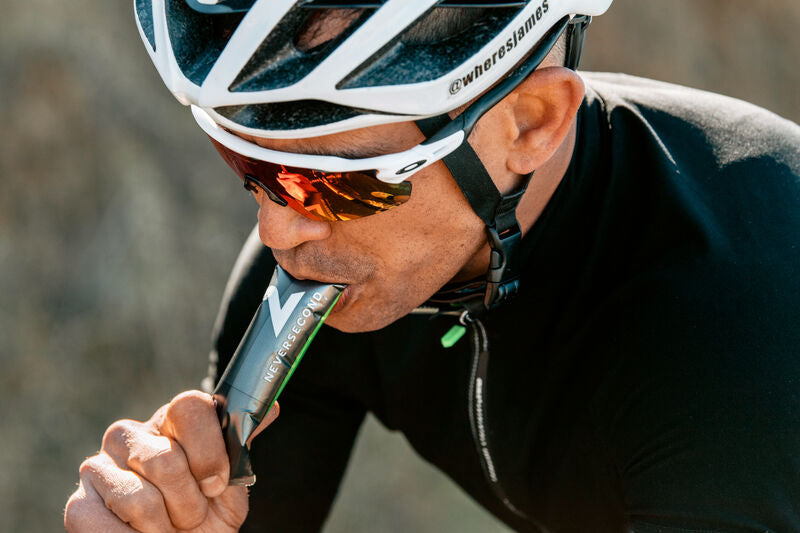 Cyclist sipping a neversecond gel
